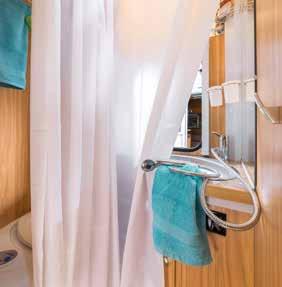 Droge handdoeken Het handdoekrek maakt een einde aan rondslingerende, natte handdoeken.