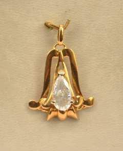 5 g 85 700,00/800,00 Broche en plane avec pete pare en métal sere de d 1 diamant taille ancienne +/- 0.