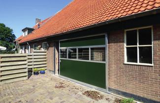 breed, 5m hoog) met gepoedercoat frame en