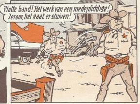 behoort. In Figuur 90 laat Lambik aan Jerom weten dat hun auto platte band heeft in de Vlaamse prent.
