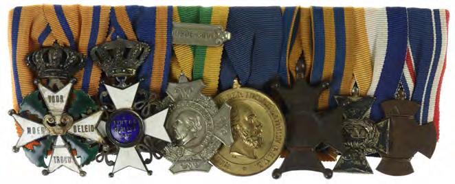 2430 2430 Spang met 7 onderscheidingen: Ridder 4e klasse Militaire Willems Orde, Ridder Orde van de Nederlandse Leeuw,
