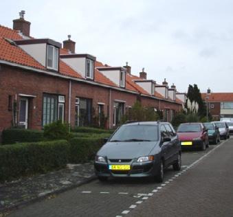 Zijn oude plek was in de zijgevel van de rij eengezinswoningen aan de voormalige Rietvinkkade 1 t/m 18.