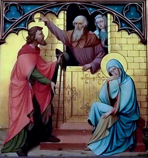 In het Maria altaar een afbeelding van Josef en de zwangere Maria die onderdak