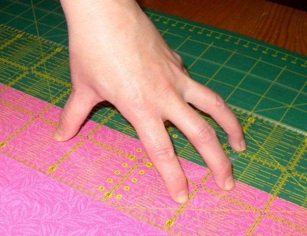 Het is heel plezierig om een 15 x 30 cm liniaal als tweede liniaal te gebruiken. Eventueel kunt u de lijnen en maten van de mat gebruiken bij het snijden van stukken die groter zijn dan 15 cm.