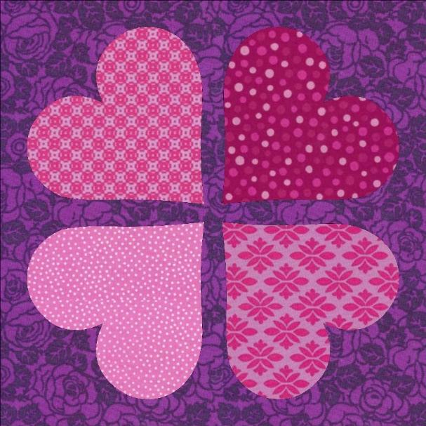 53 Probeer het maar eens uit: Machinaal appliqueren Geappliqueerde harten Naai de harten met een (kleine) zigzagsteek of een festonsteek op de quilttop.