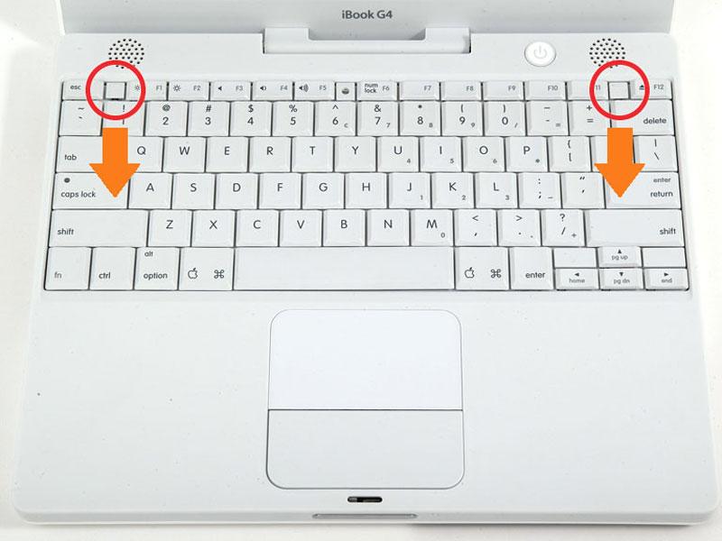 Stap 3 Toetsenbord Trek het toetsenbord ontgrendelingslipjes naar u toe en til op het toetsenbord totdat het knalt gratis.