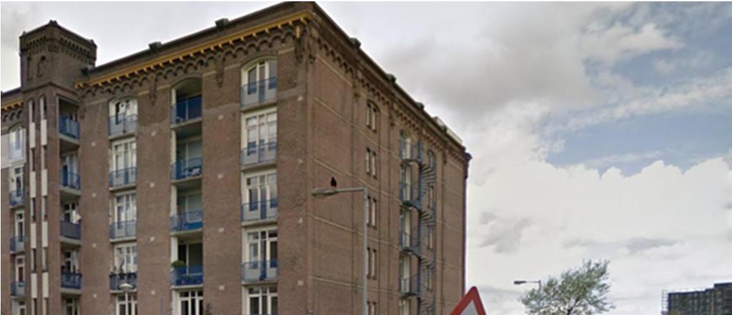 2.7 Inventarisatie belendende panden Ten westen van de te realiseren nieuwbouw bevindt zich een flatgebouw aan de Zeeburgerkade, zie Figuur 4.