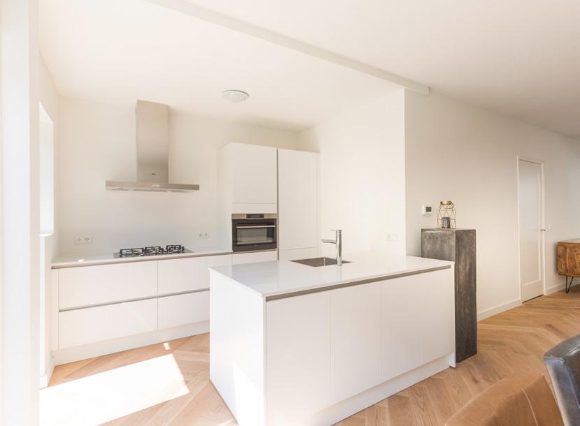 Modern open plan kitchen with a kitchen island.