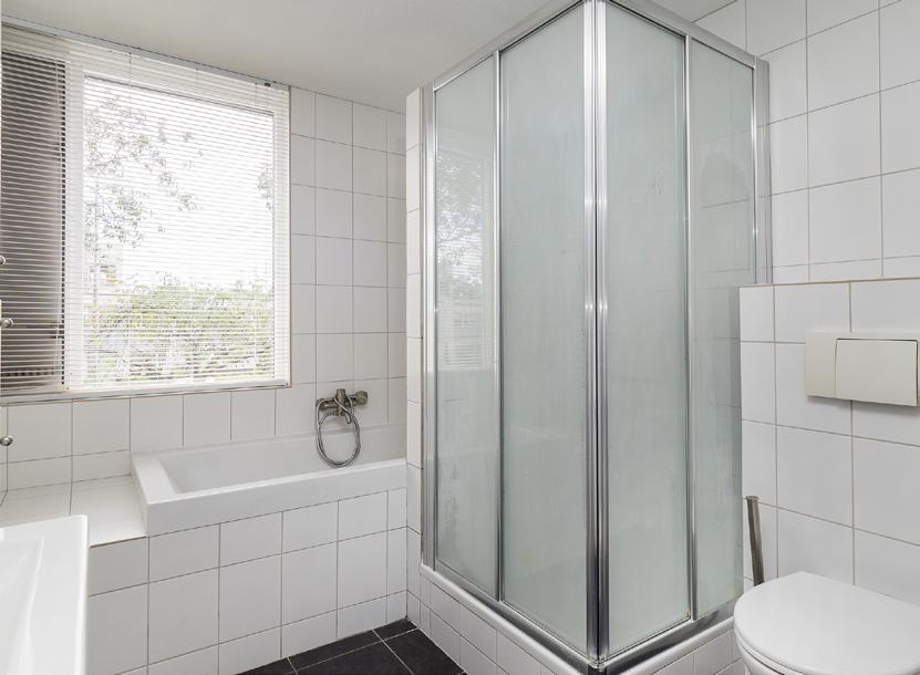 Bathroom Fully tiled bathroom (2005) with a shower,