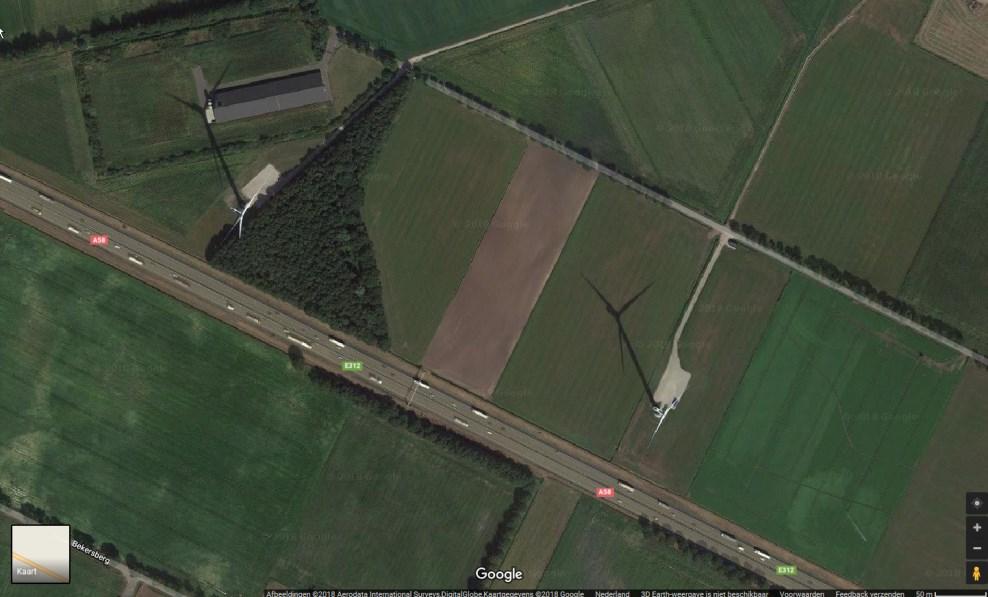 Luchtfoto van varkenshouderij nabij windmolen (75 meter).