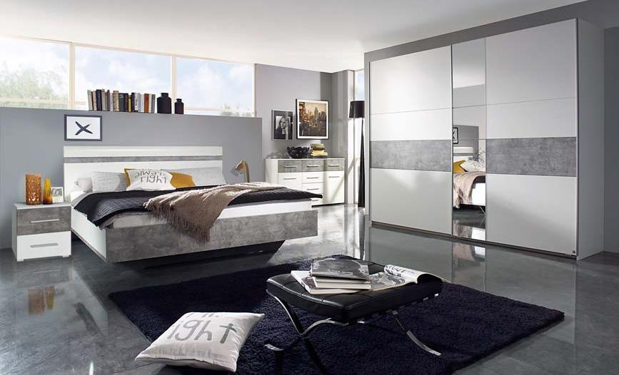modern slaapkamer in wit gecombineerd met betonkleur.
