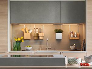 filigno De filigno keuken valt op door haar sterke geometrische uitstraling en maakt een volledige integratie van keuken en woonkamer