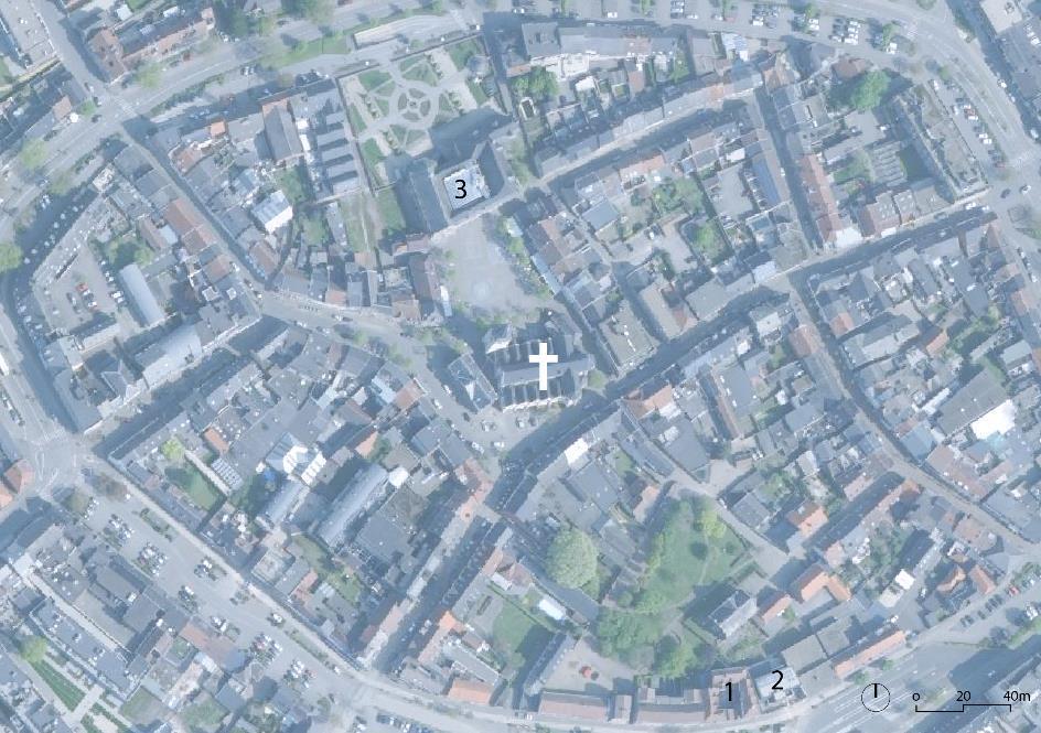 2.1.3. Situering van het gebouw in zijn ruimtelijke omgeving De Sint-Michielskerk ligt in het centrum van de stad Bree, midden in het commerciële hart en vlakbij het stadhuis (3).