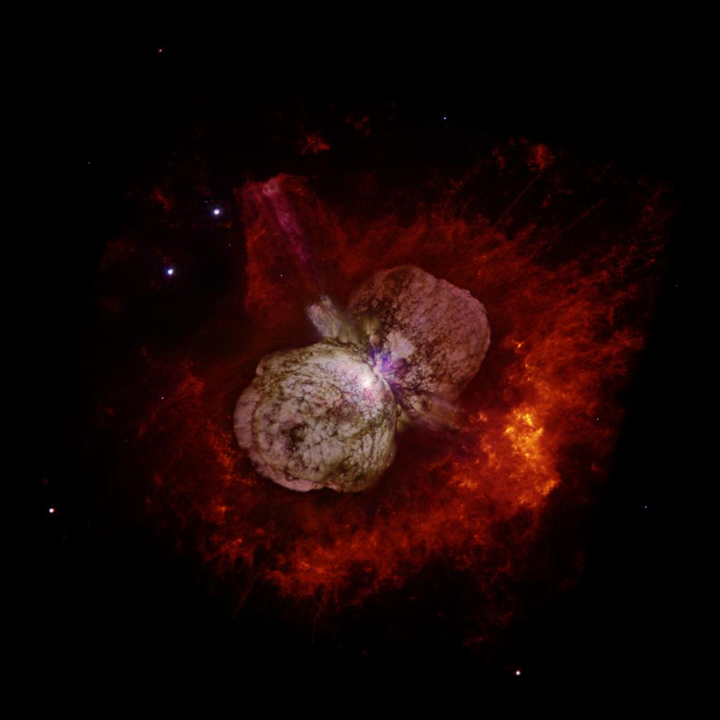 Samenvatting Figuur 5.16 Wolk van gas en stof rondom de haltervormige Homunculus nevel, in het centrum waarvan zich de zware dubbelster Eta Carinae bevindt.