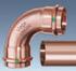 Systeem van koperen of bronzen persfittingen voor koperen leidingen voor de verdeling van koud en warm sanitair water, verwarmings- en koelwater