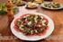 Rundercarpaccio met rucola, Parmezaanse kaas en pesto dressing 9,95. Feta kaas salade Geserveerd met toast 6,50